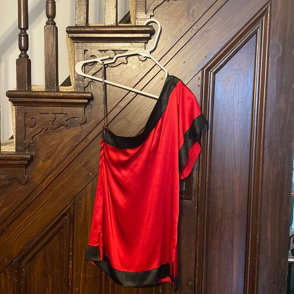Bebe, red, one off the  shoulder silk top.